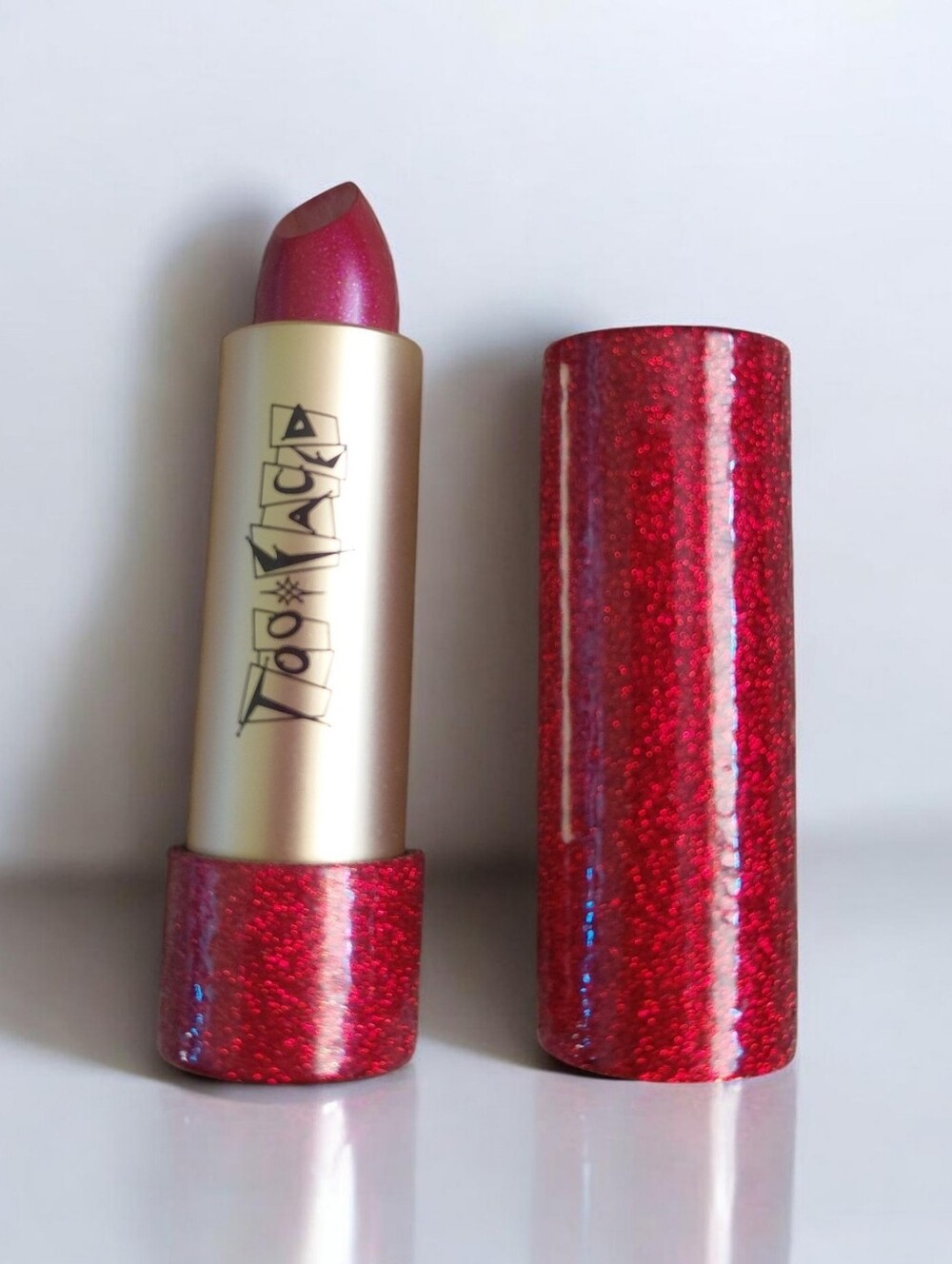 Too Faced Glitter Lipstick--Too Too Hot